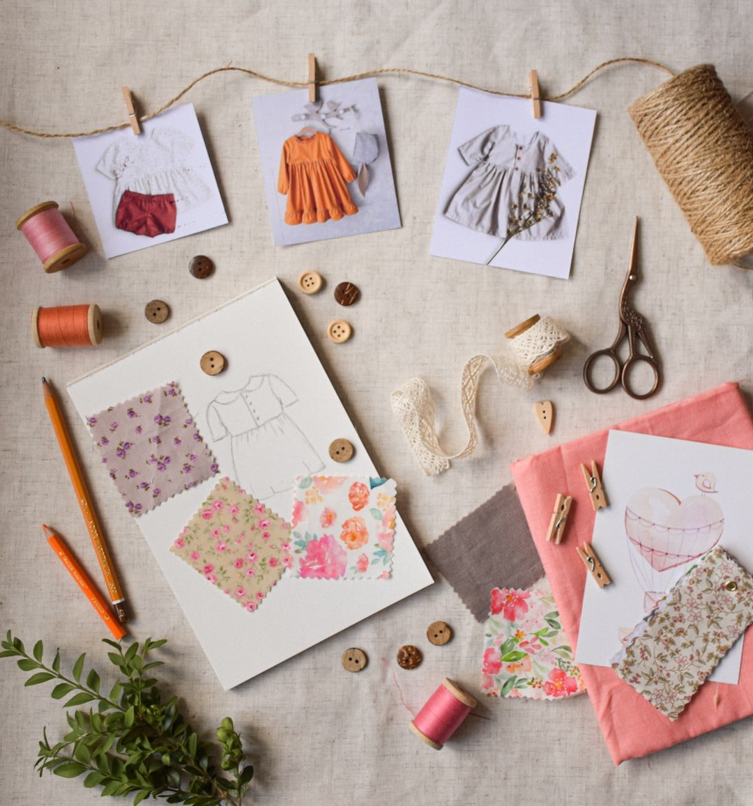 <p>Various crafting and sewing materials laid out on a table</p>